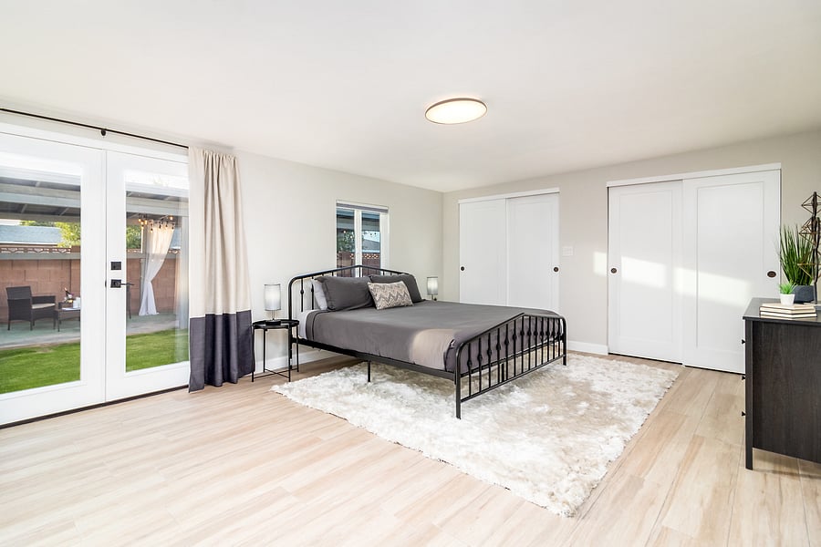Master Bedroom 1: King bed, 55'' Smart TV and large closet. Connected bathroom with rainfall shower and extra large freestanding bathtub. 