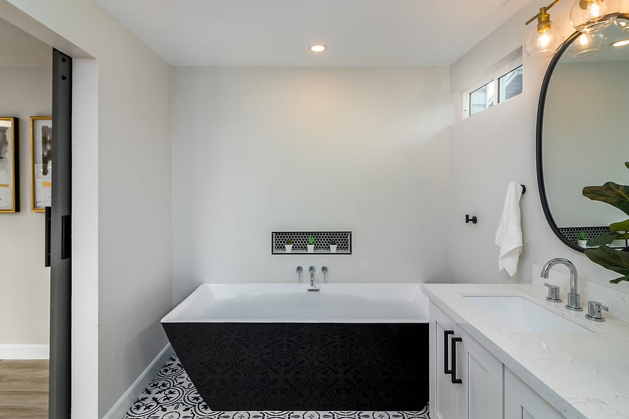 Master Bathroom 1: Rainfall shower and extra large freestanding bathtub.