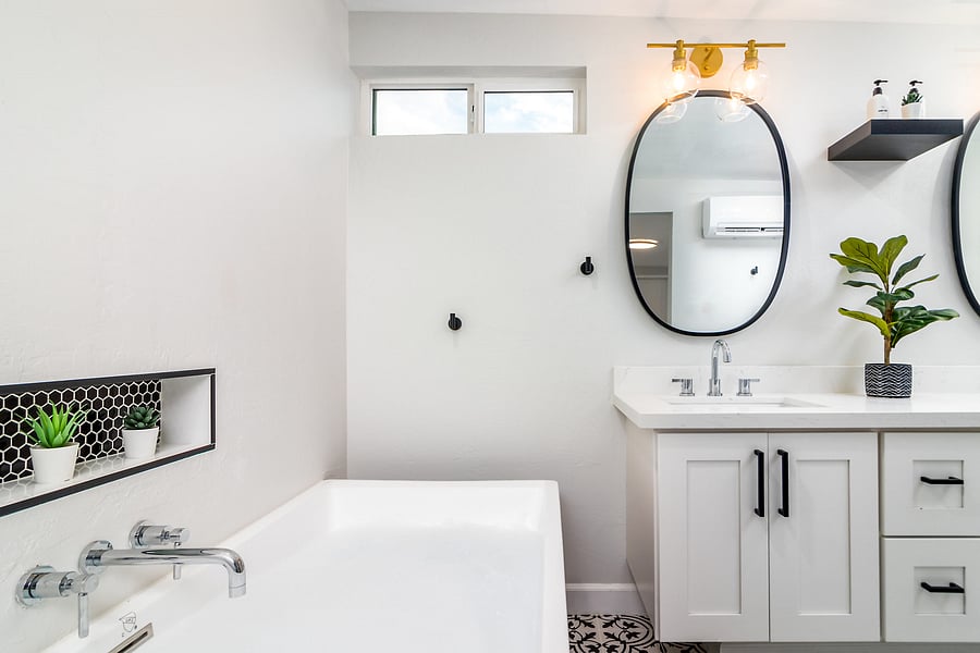 Master Bathroom 1: Rainfall shower and extra large freestanding bathtub.
