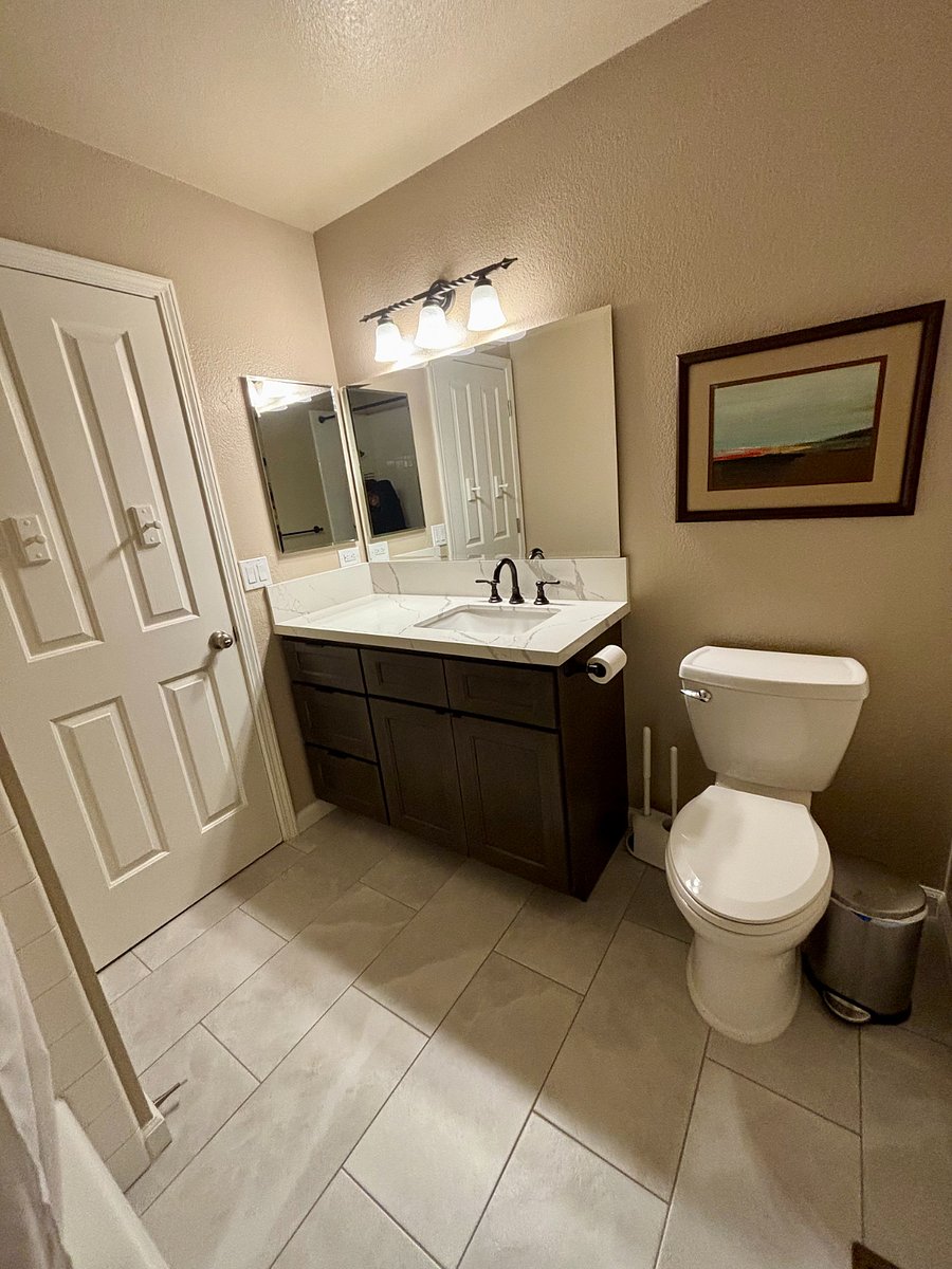 Shared bathroom. Fully renovated with new floor, cabinet and countertop. Tub + shower.