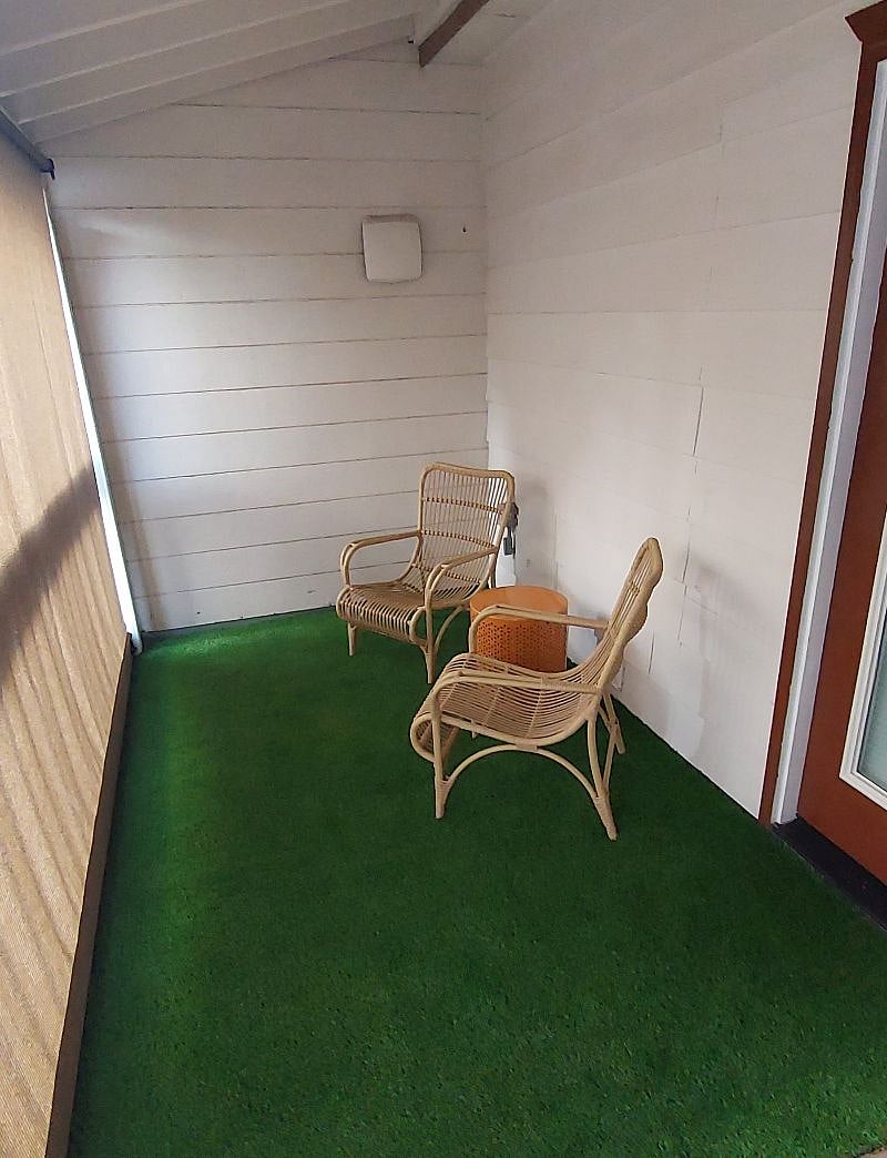 Patio with shade down. Available for our "2 BR Suite - Unit 202" guests renters use only.