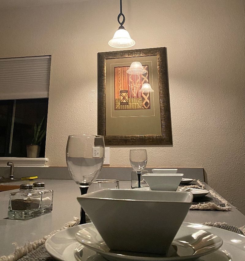 Dining counter arrangement, setting and lighting.
