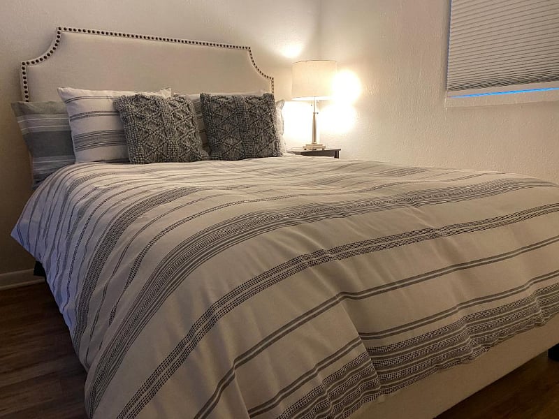 Bedroom includes a LG 55" swivel wall mounted Streaming TV