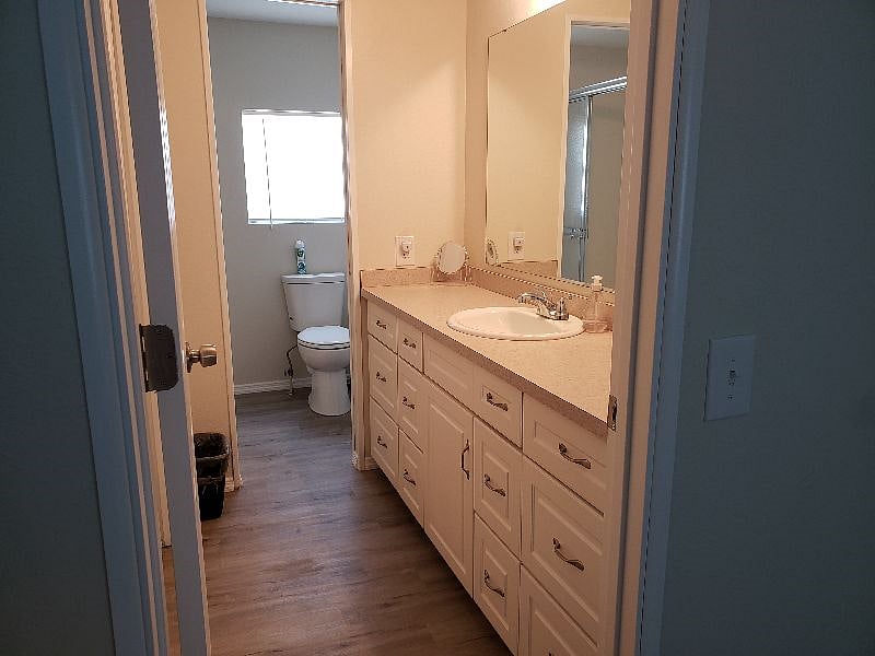 Vanity is separate from shower area, allowing room and comfort when getting ready. Full size closet conveniently located across from vanity