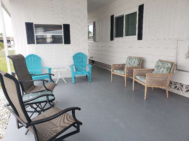 Outdoor seating under shade of carport (chair quantity/arrangement may change without notice)