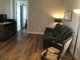 Your open living area leading to your master suite.