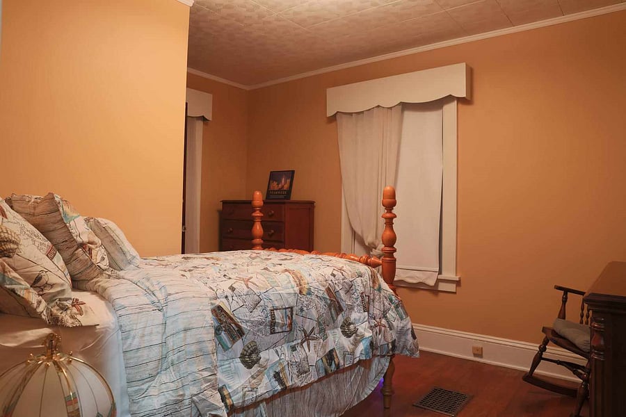 Bedroom # 4 with additional storage located in the attic.