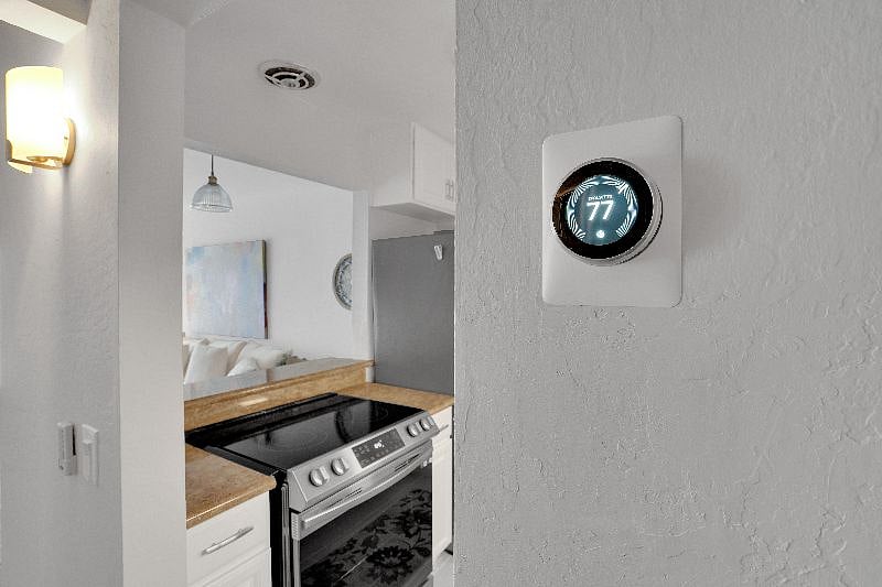 Nest thermostat to set your temperature for home and away!