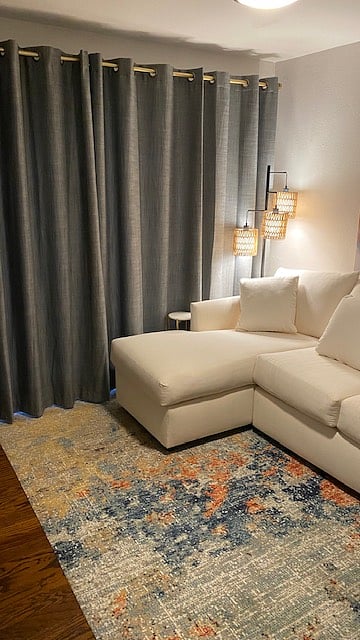 Black out curtains in living area.
