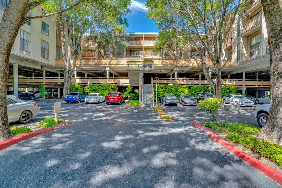 One assigned parking space in garage and plenty of visitor parking.