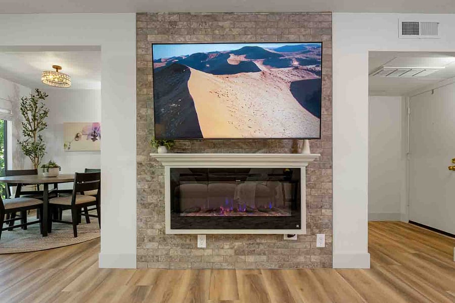 Enjoy sitting in front of the fireplace and relaxing or enjoying some screen time.