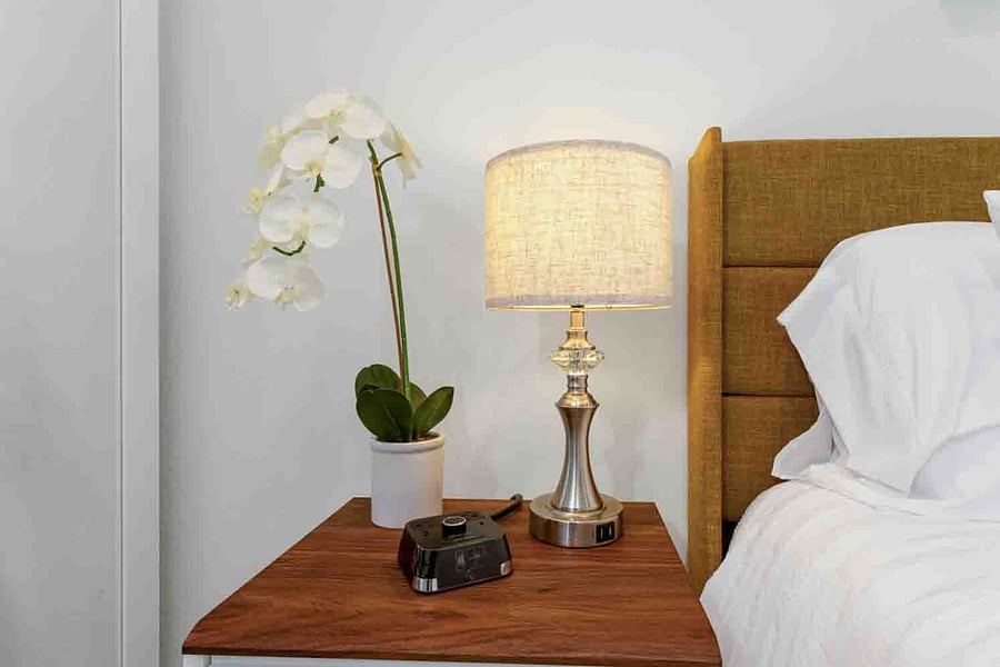 One touch lamp with alarm clock, extra outlets and USB ports