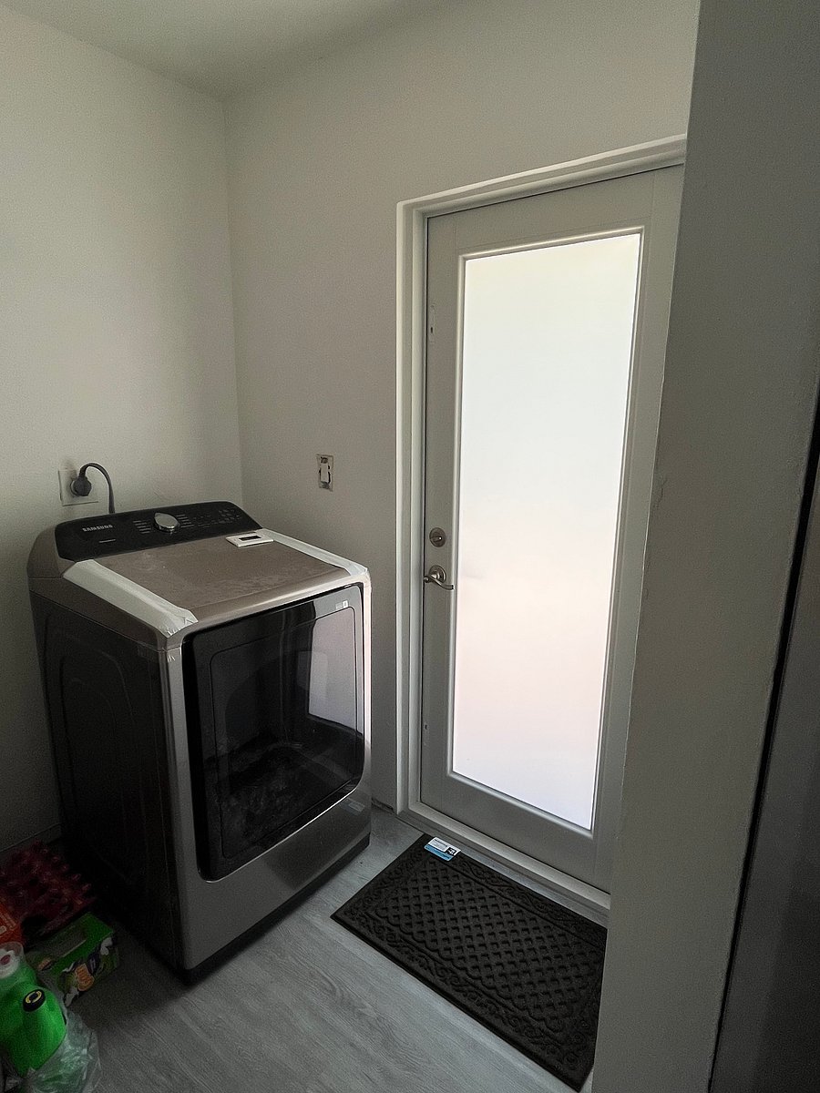 Hurricane doors and windows! This leads to backyard and patio!