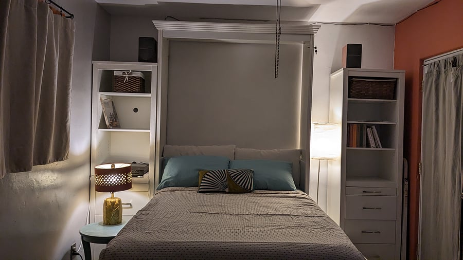 When you're ready for some zzzzzs, easily pull the Murphy bed from its cabinet and directly over the sofa, brew a cuppa, close the black out curtains, and rest assured the bed folds back into its cabinet as smoothly as it came out. Bonus - it's easier and faster than making the bed!