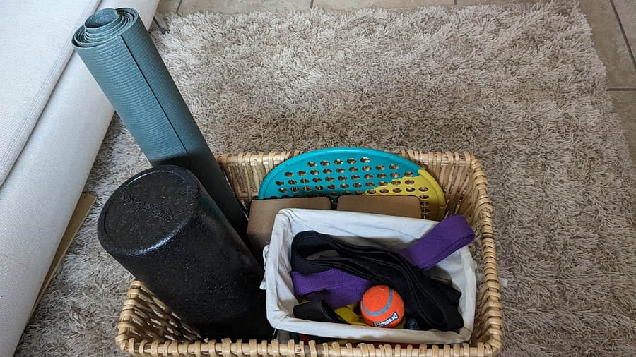Yoga mat, blocks, straps, resistance bands (the ones you secure in a closed door), and other work out goodies.