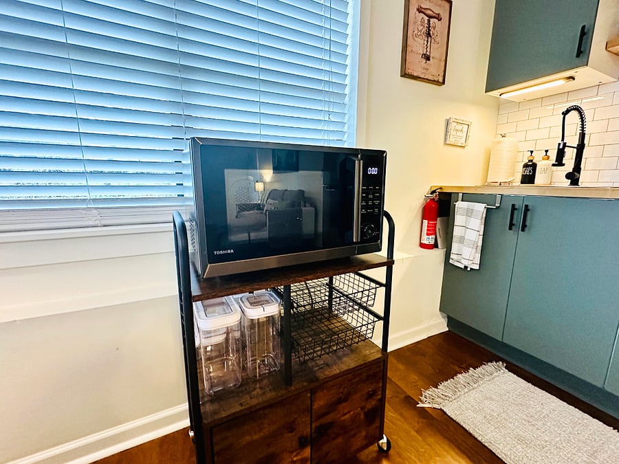 This is a microwave/air fryer/oven combo! Capable of cooking a regular sized frozen pizza, meats, veggies, casseroles, etc. All in one and brand new! 