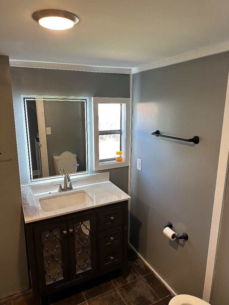 Led lit mirror in bathroom 