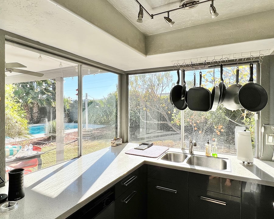 Kitchen with beautiful view of backyard