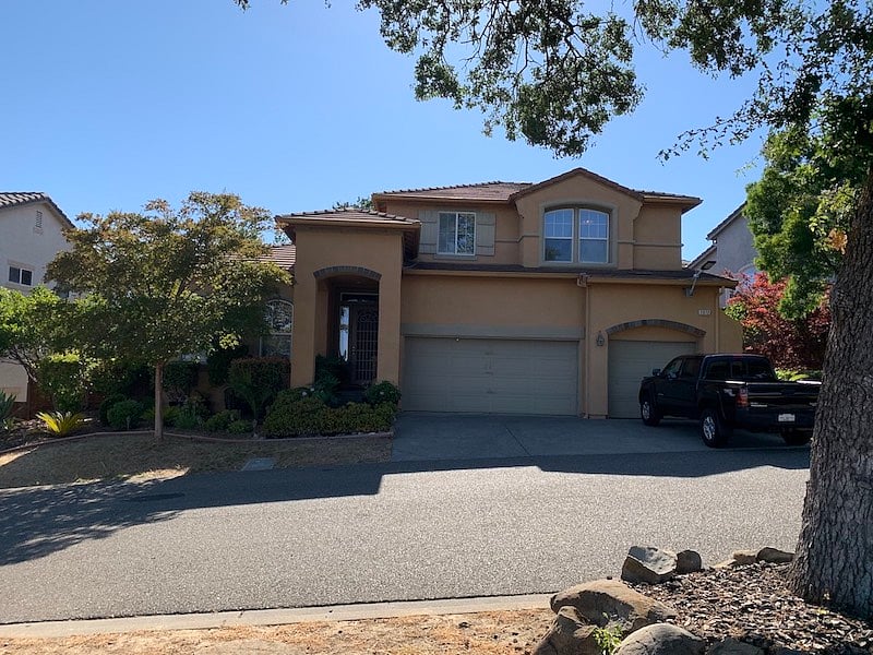 Front view of home. Rental bedroom top right