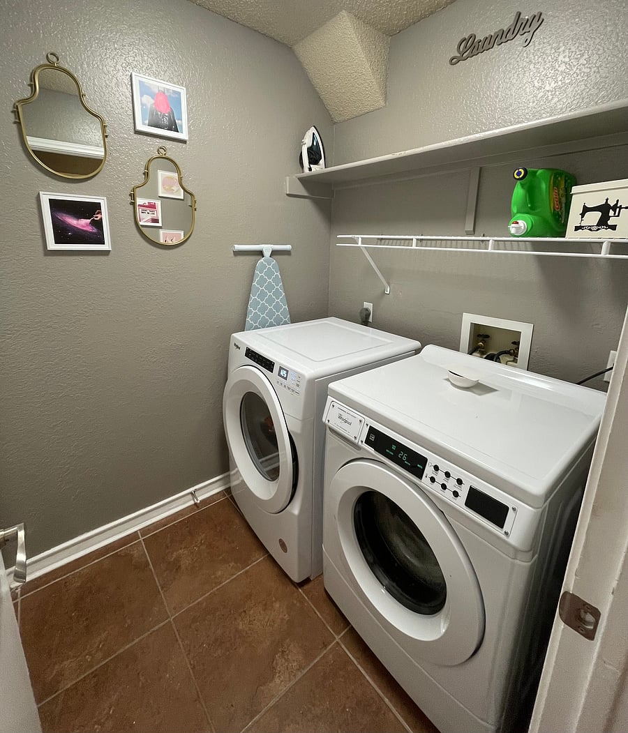 Washer, dryer, full-size ironing board, iron, sewing repair kit