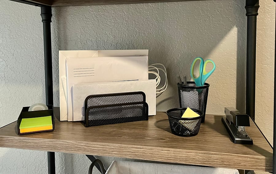 Basic office supplies, envelopes, scissors, tape, pens, clips, post-its located in Master Bedroom - Bedroom #1
