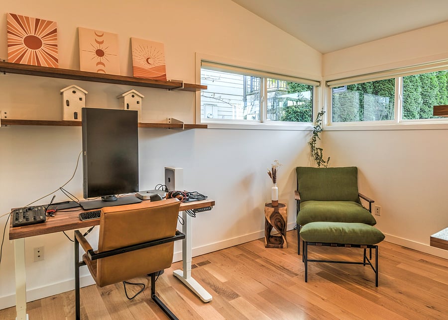 Upstairs study with standing desk and built in shelves