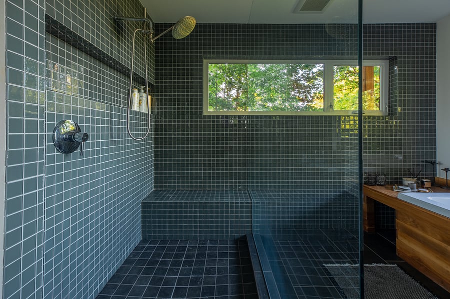 Primary suite Walk in Shower with rain shower and hand held shower.