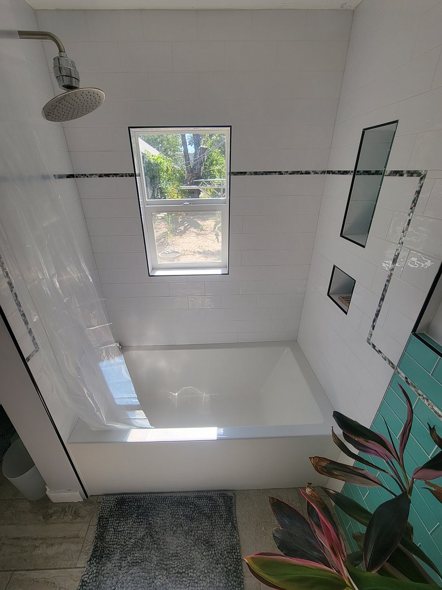 Soaking tub and 7ft rainshower