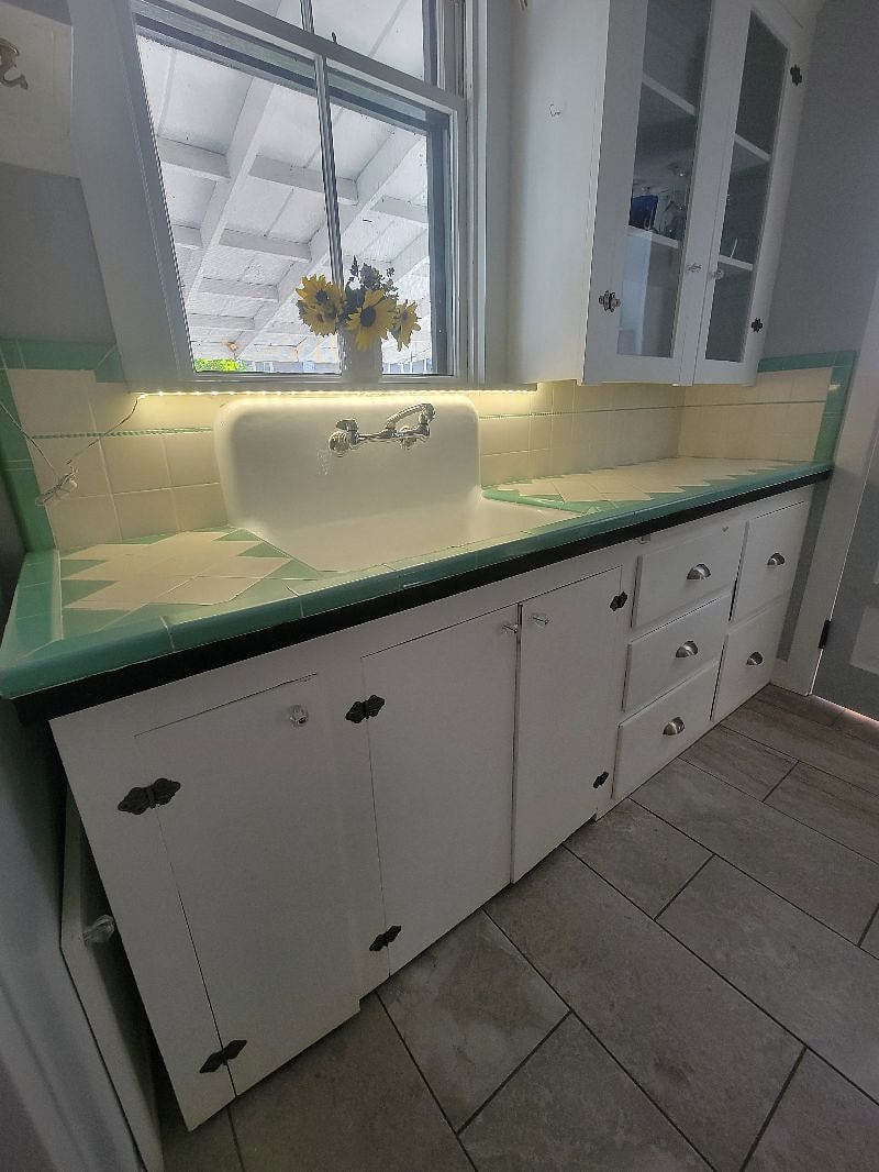 Counter with farm house deep sink.