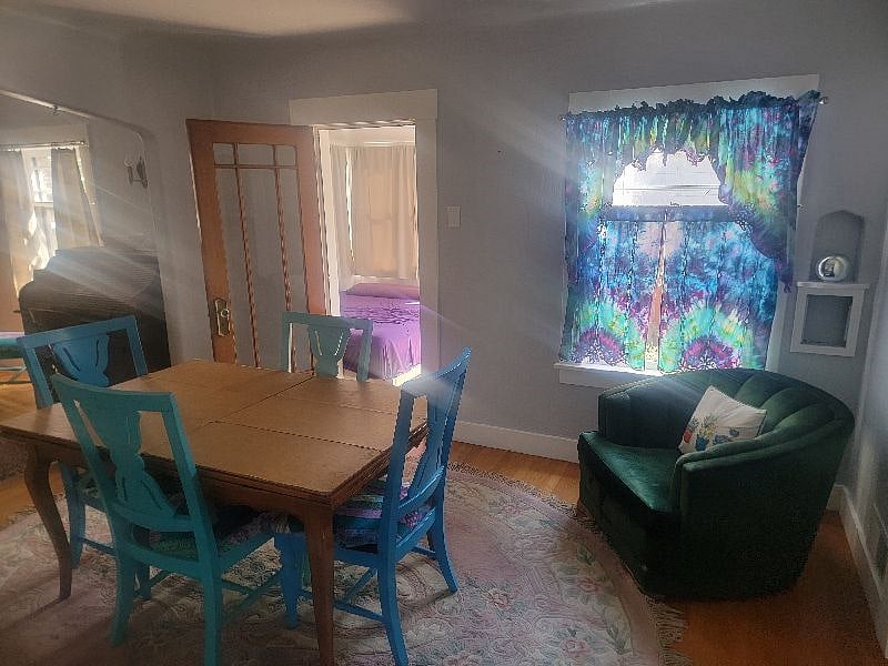Dinning room with an expandable table to seat 6. Reading chair with perfect over shoulder natural light.