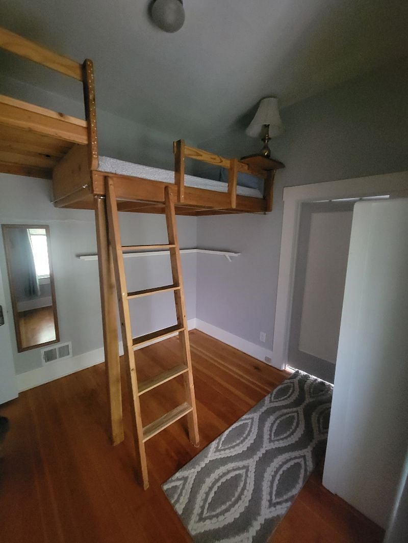 Built-in loft bed for optimal space.