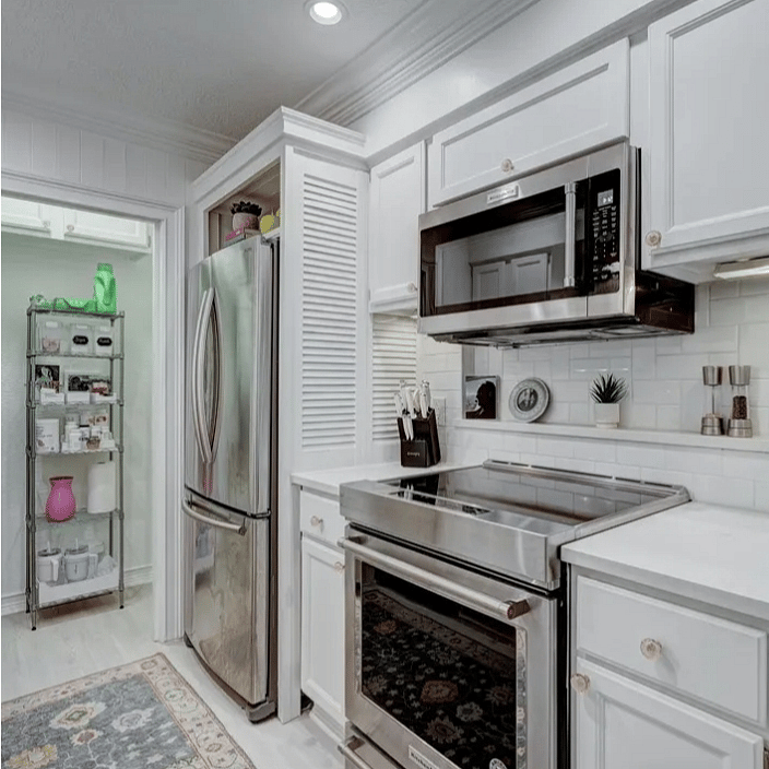 All new Kitchen Aid appliances, induction cooktop/range, microwave, refrigerator and dishwasher