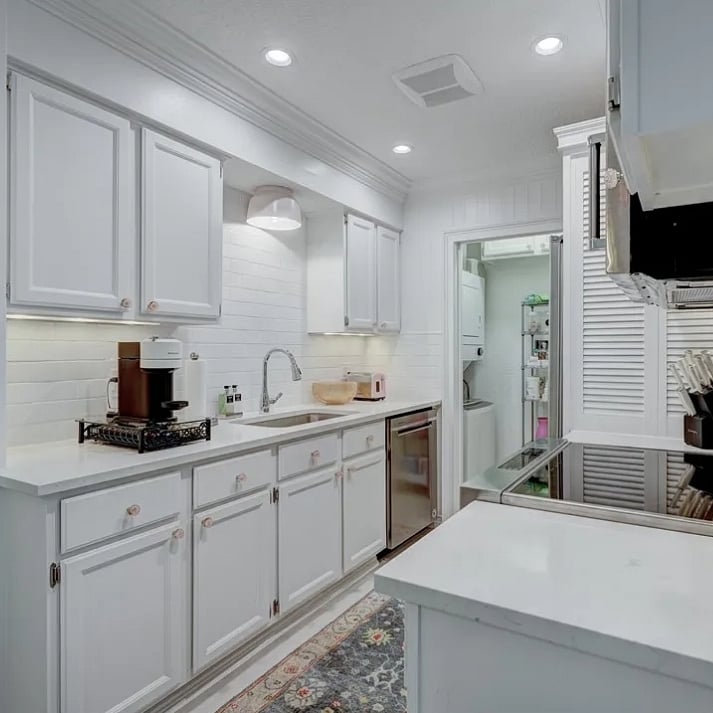 All new Kitchen Aid appliances, induction cooktop/range, microwave, refrigerator and dishwasher