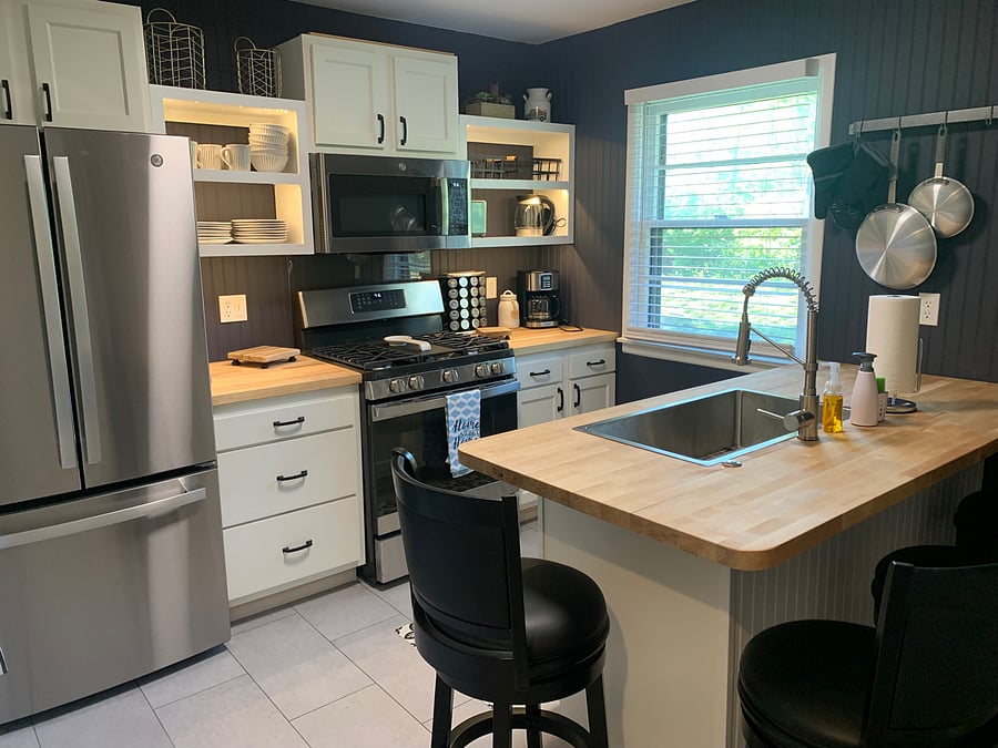 An eat in kitchen allows the cook to visit with others and contains the "mess" to one area.