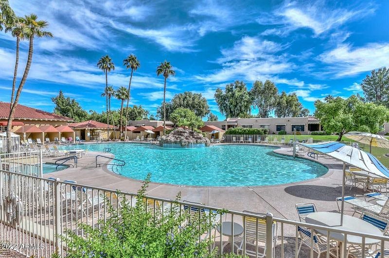 Heated pool and spa next to community center and on-site restaurant