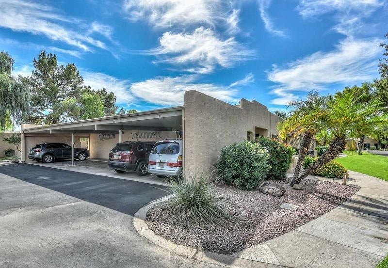 Well kept carport w/storage closet