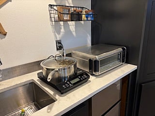 Two chef-loved essentials: a sleek countertop oven and a precision induction cooktop. Its been said on Food Network that some pros prefer induction for its instant heat controland here, you get that same power at your fingertips.