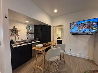 For the ones that enjoy home cooked meals. The table shifts easily into a prep station, giving you the extra counterspace you need to slice, stir, and saut without feeling cramped. And with the TV angled perfectly toward the kitchen, you can catch up on your favorite show while your pasta simmersbecause here, cooking feels less like a chore and more like a moment to savor.