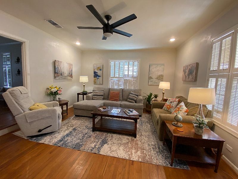 Comfortable living room with La-Z-Boy swivel rocker/recliner, couch and loveseat (pull-out twin bed)