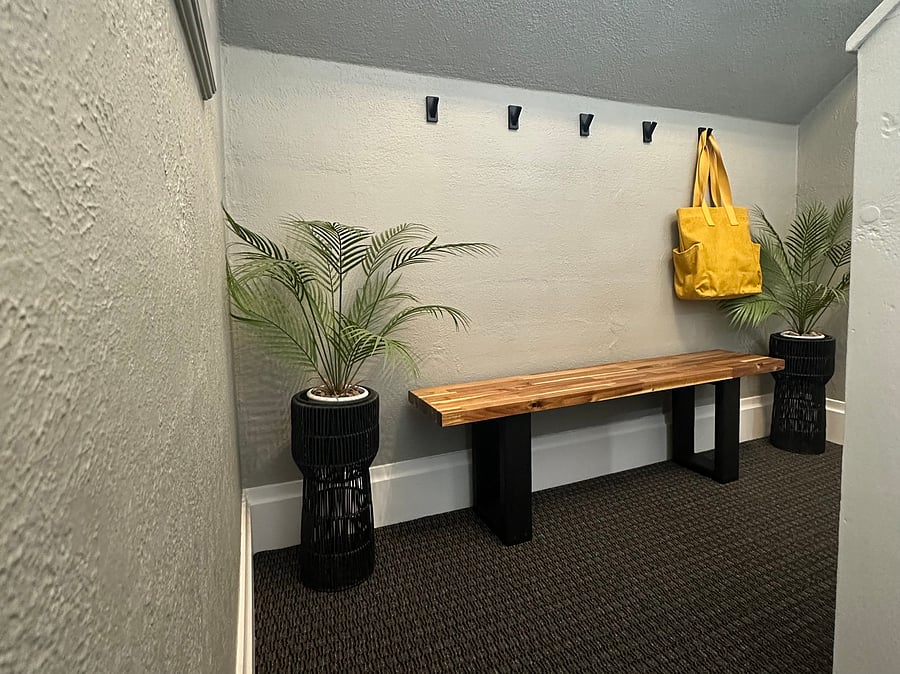 1st landing into unit with bench to sit on and place shoes under, hooks for hanging coats/purses, shopping bag (WA state charges for shopping bags so we have provided one for you)