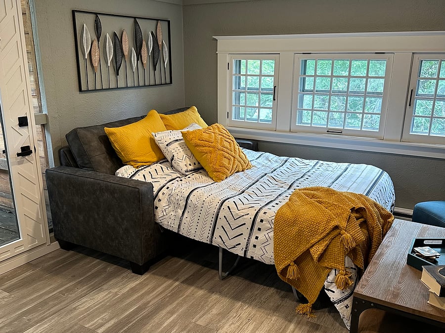 Sofa pulls out into "Full" sleeper to sleep 2 of your guests