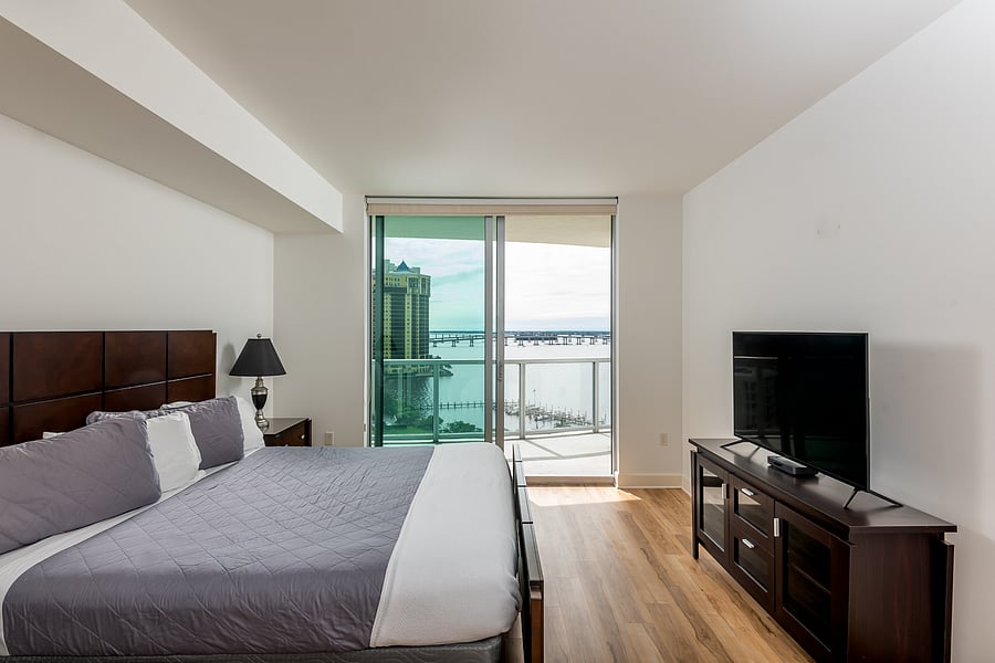 Master bedroom with ensuite bathroom & smart TV & river view