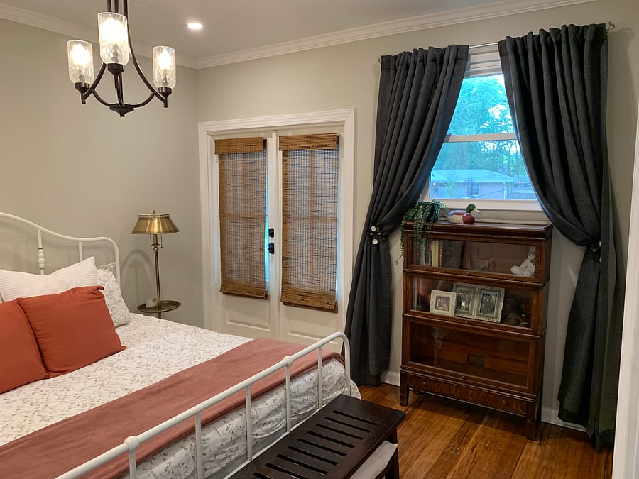 Bedroom with shades and blackout curtains (a must for night shift!)
