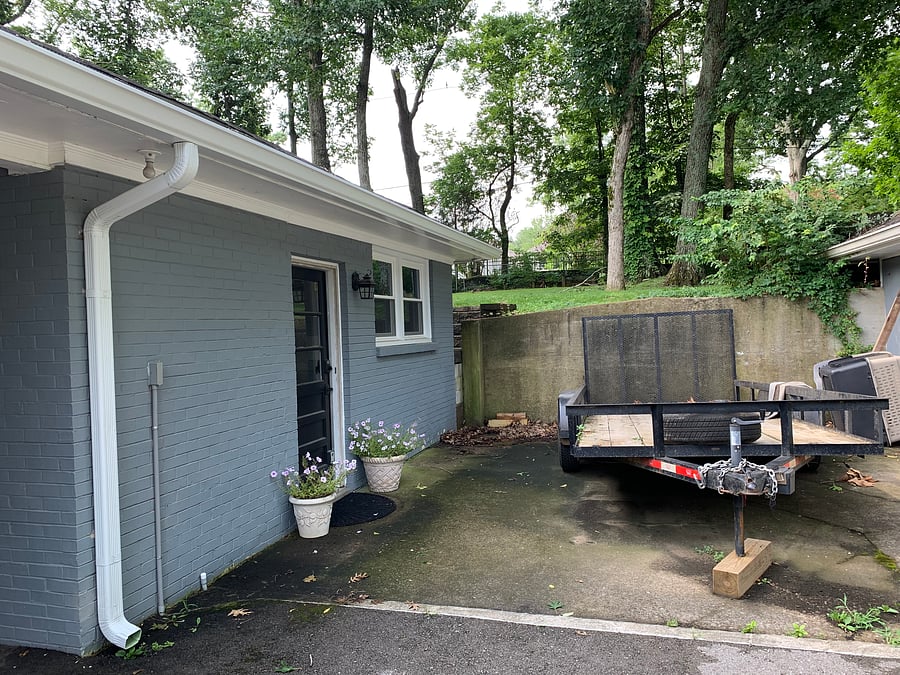 parking right outside the front door. Trailer will be moved, but pictured here to give you idea of size. Area can fit larger vehicles.