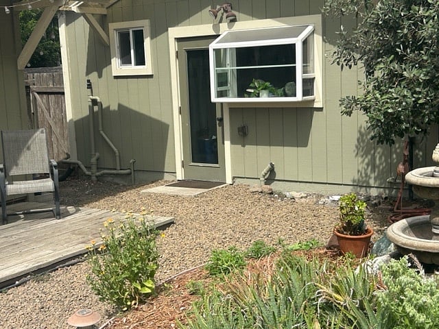 Casita back door leading to private garden and sitting space.