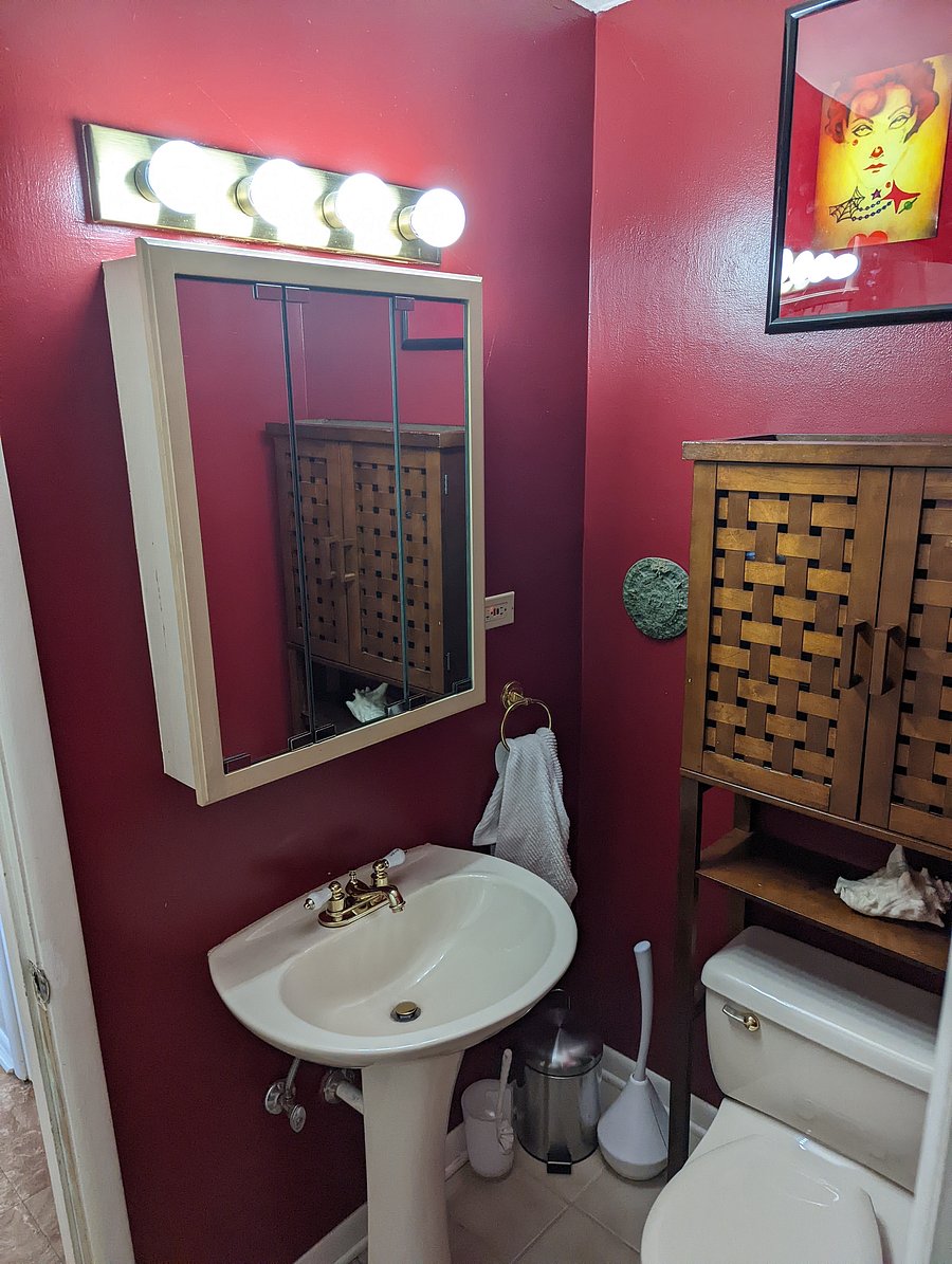 Half bath; attached to Master and accessible by the hallway as well