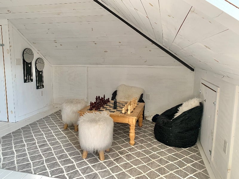 Third floor attic family/den/gameroom additional space with chess table, ping pong table, comfy recliners and plenty of space to exercise or stretch out