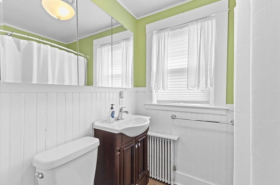 Full bath with tub/shower combo, three medicine cabinets and storage closet