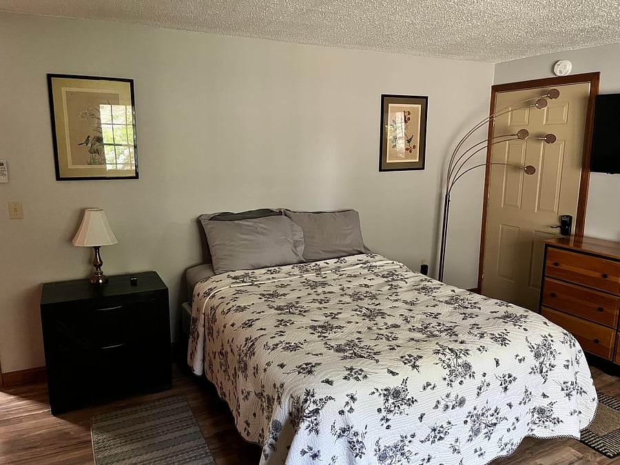 Bedroom with laundry room entry