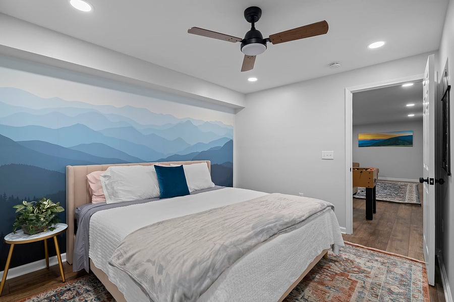Downstairs master suite with king sized bed and huge closet with ample storage.